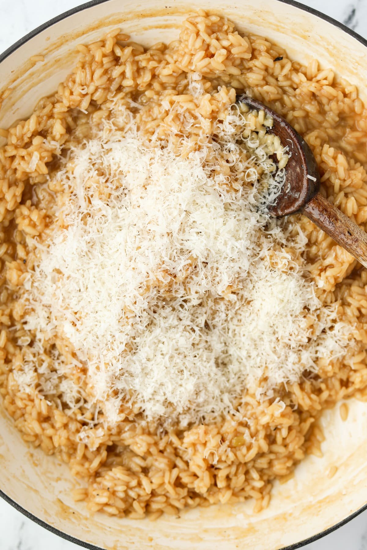 Rice with a generous sprinkling of parmesan cheese on top.
