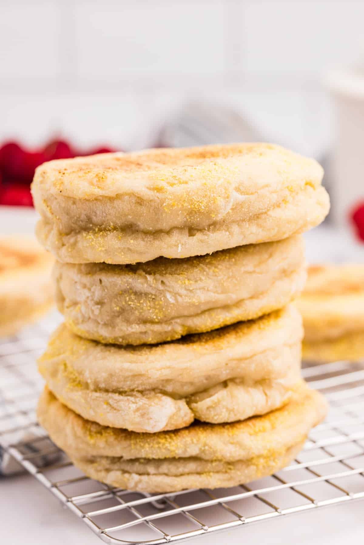 A stack of homemade english muffins.