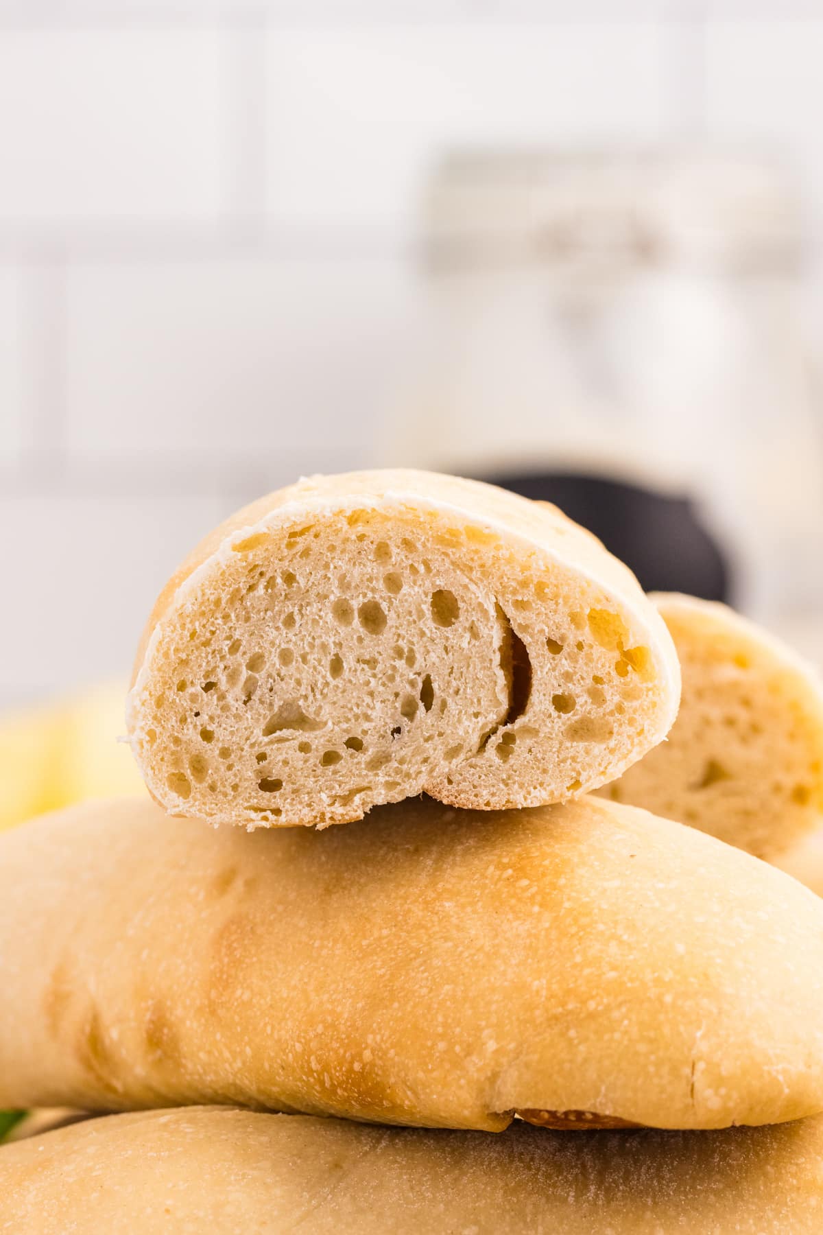 A close up look at the crumb of a homemade hoagie roll.