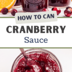 A jar of cranberry sauce with a spoon taking a portion out.