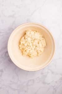 A soft dough in a mixing bowl.