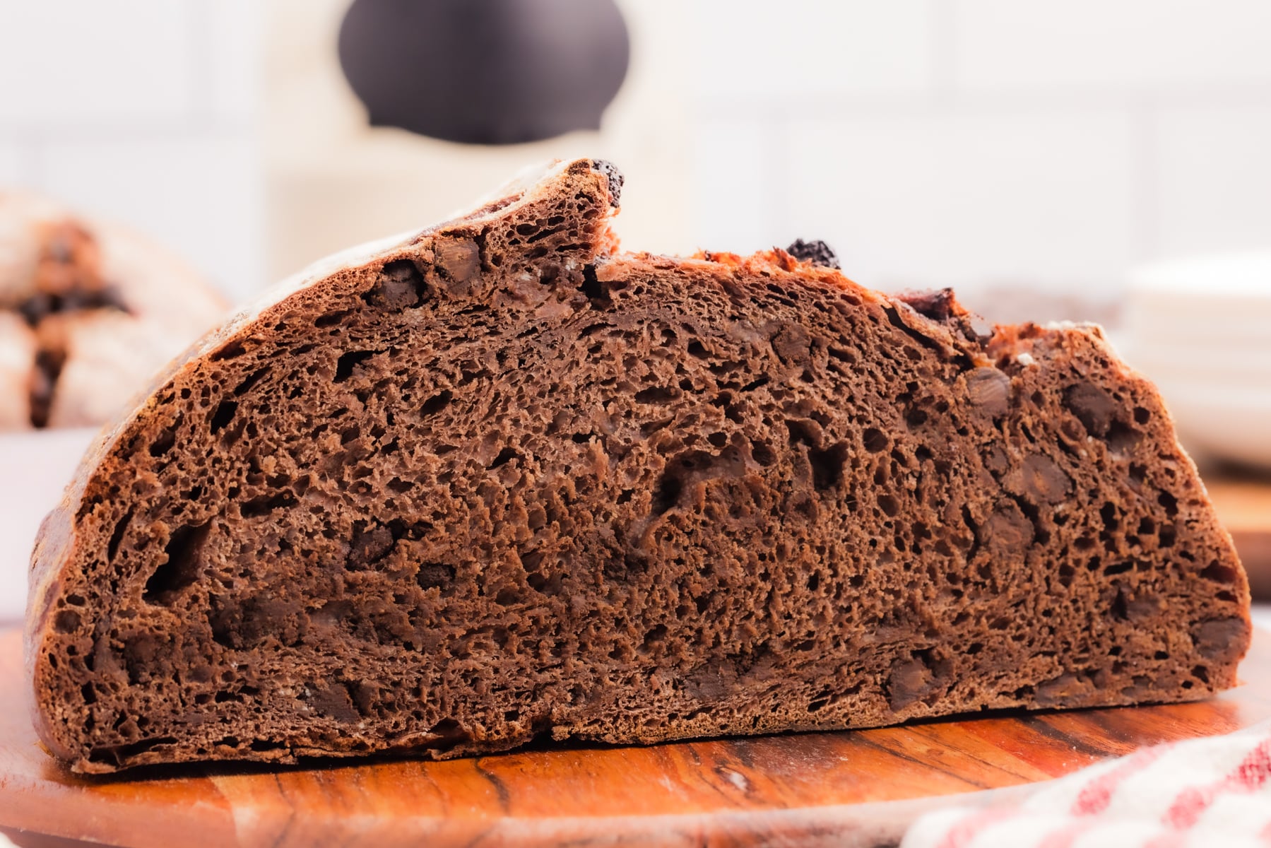 A cross section image of a loaf of double chocolate sourdough bread.
