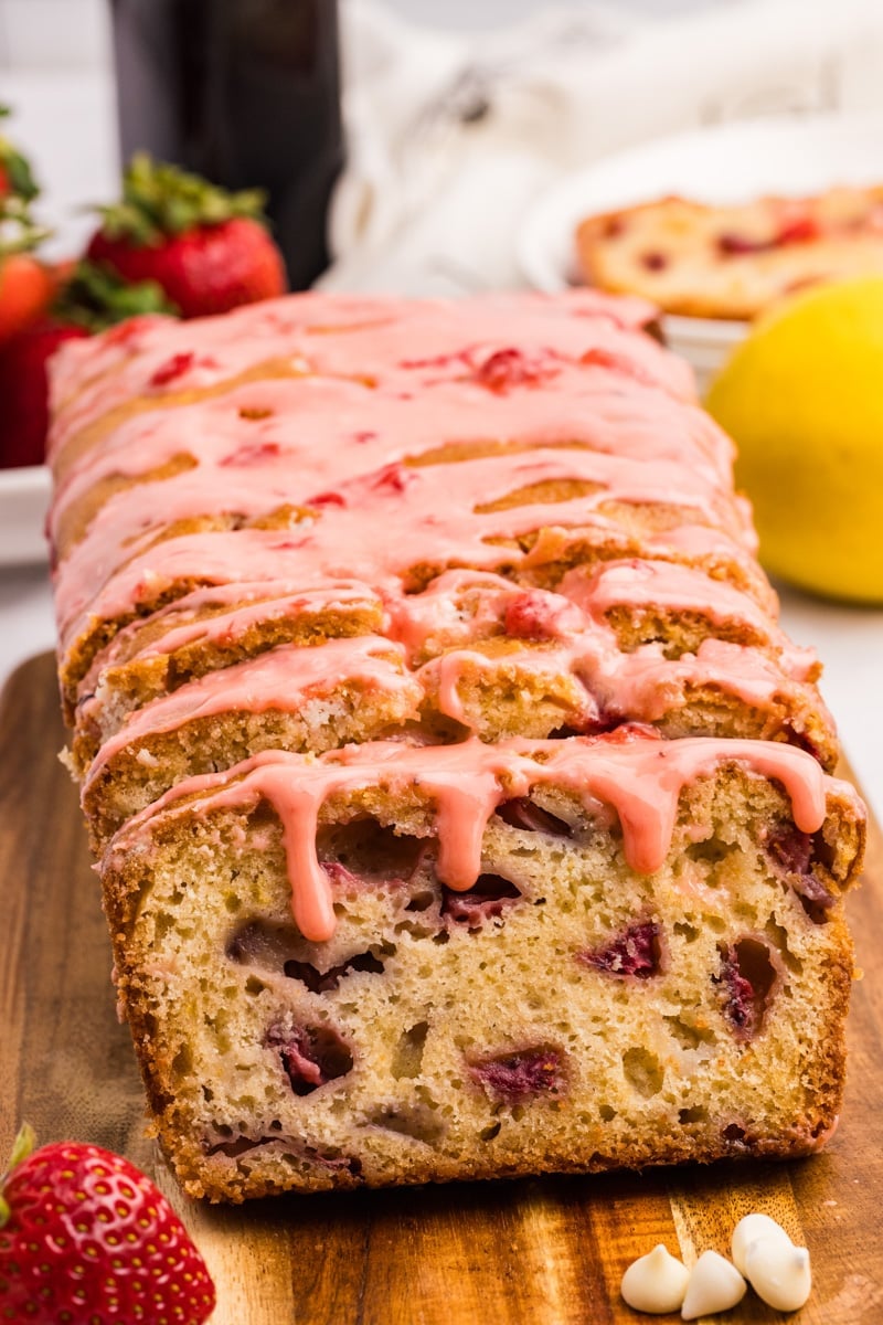 A loaf of strawberry bread with a strawberry glaze on top.